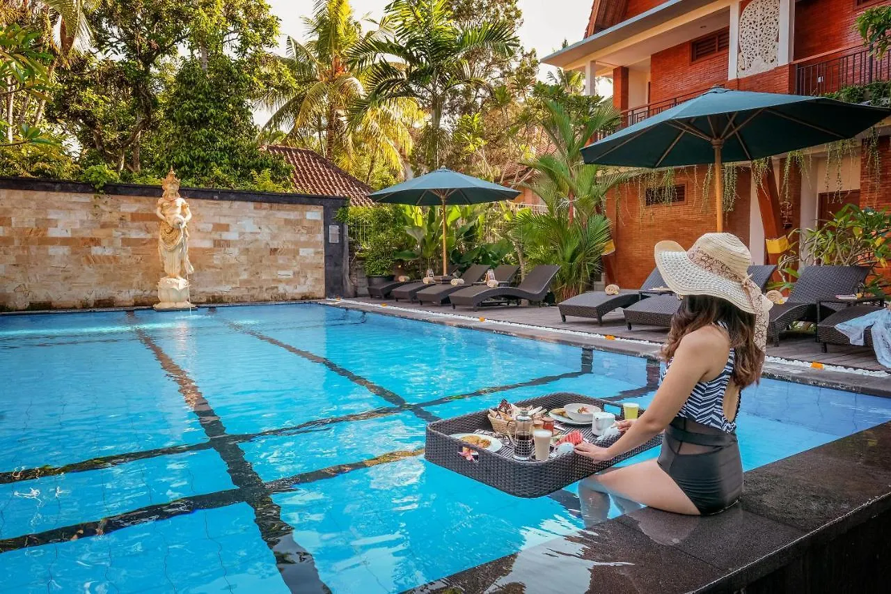 홀리데이파크 Gunung Merta Bungalows 우붓
